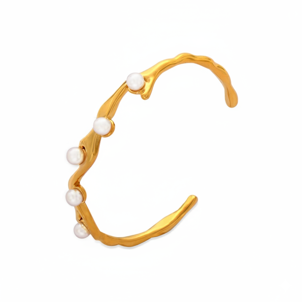 Herae pearl cuff Gold bracelet with pearls on a white background