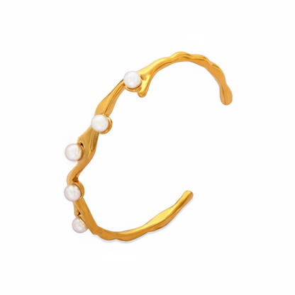 Herae pearl cuff Gold bracelet with pearls on a white background