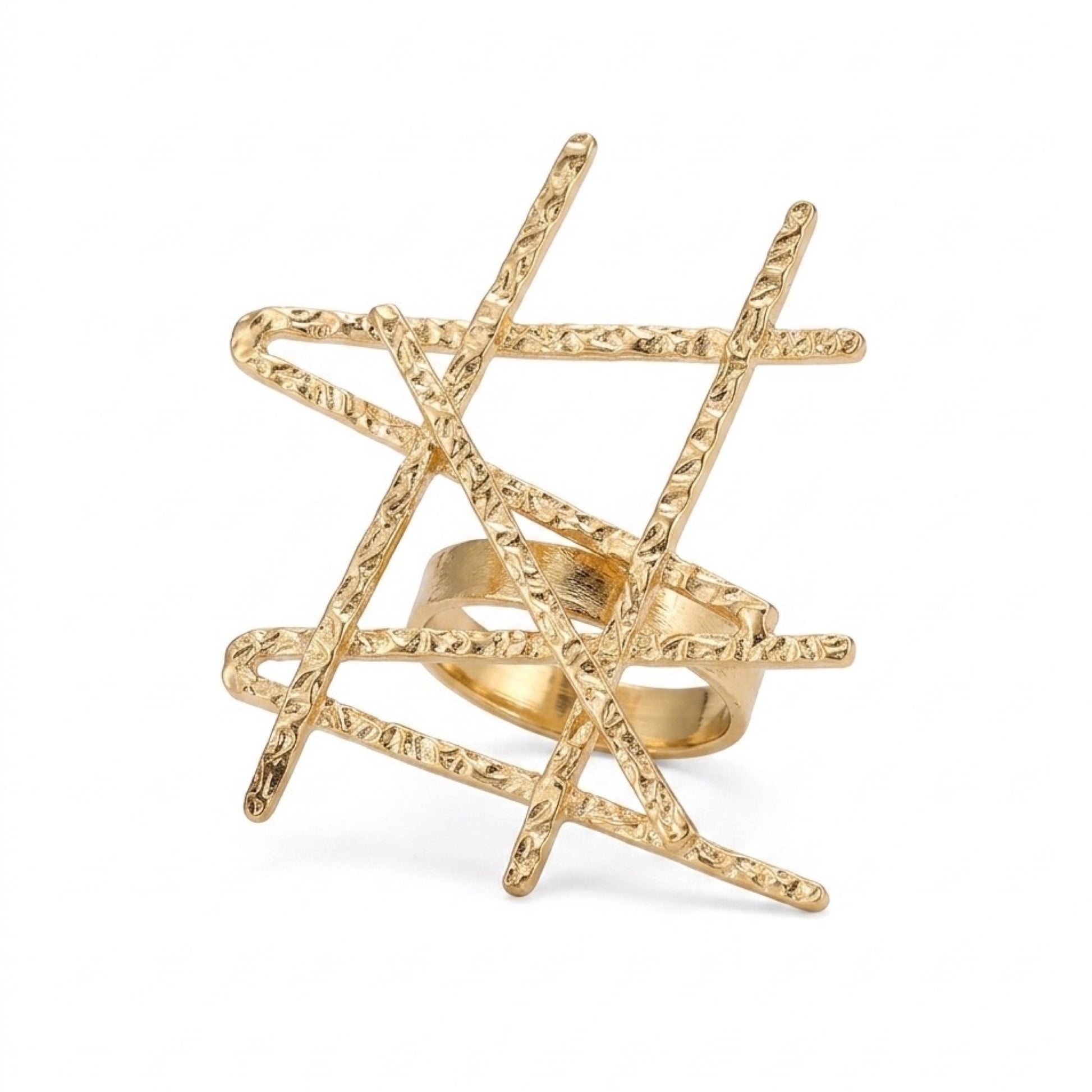 Gold ring with a geometric design on a white background