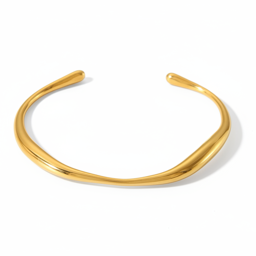 18K Gold plated bracelet on a light gray background