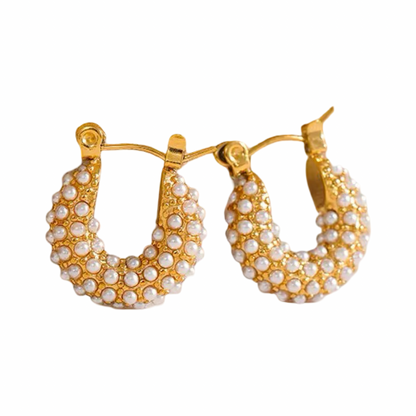 Gold hoop earrings with pearl-like beads on a white background