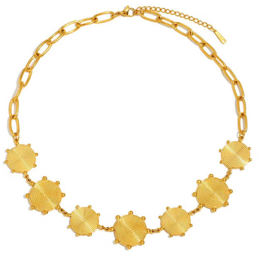Gold necklace with circular floral pendants on a white background